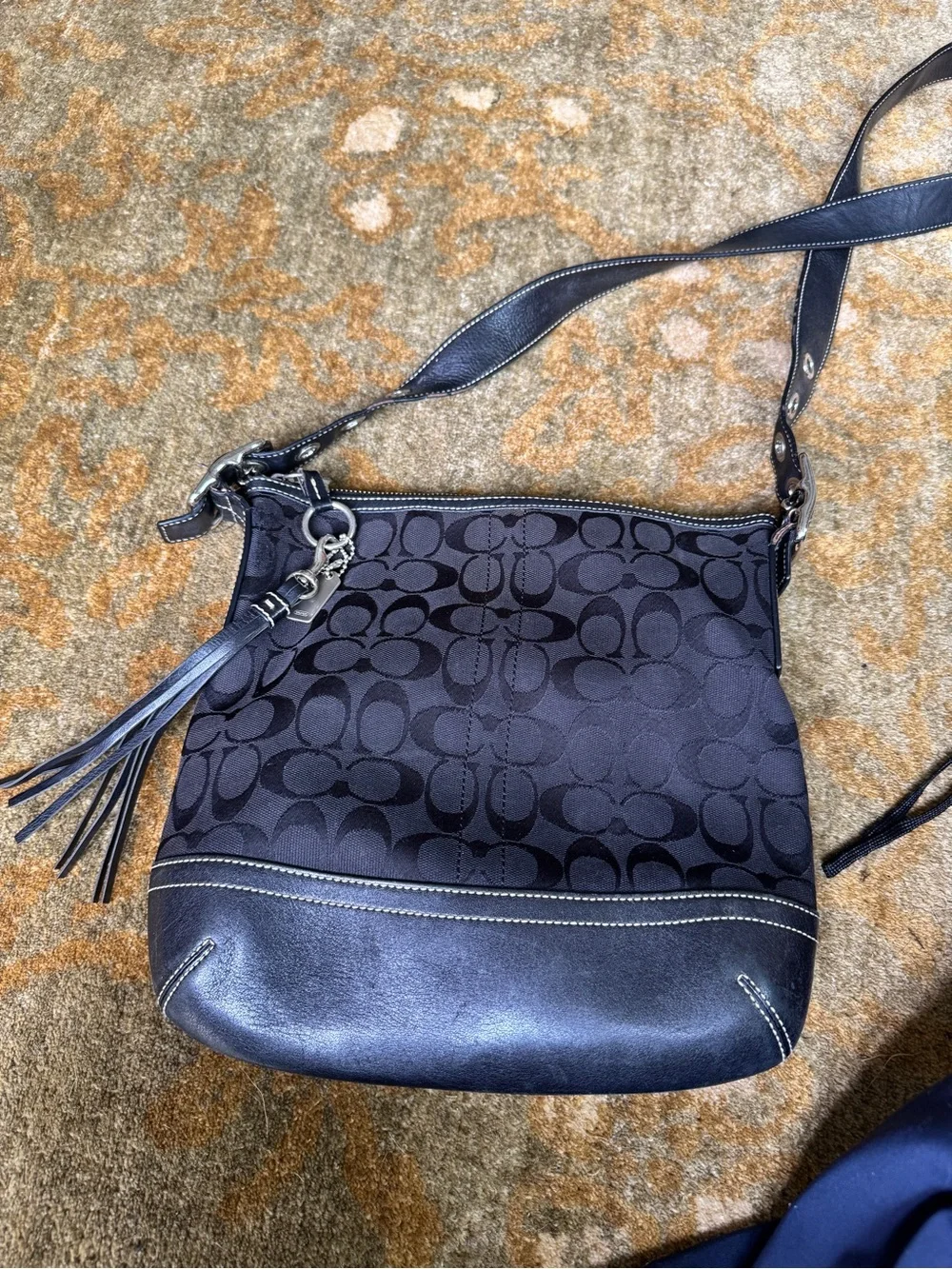 Coach Black Signature Crossbody with Tassel Charm